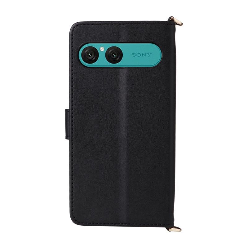 Flip Cover Sony Xperia 10 Vii Quiltet Med Rem Og Håndledsrem